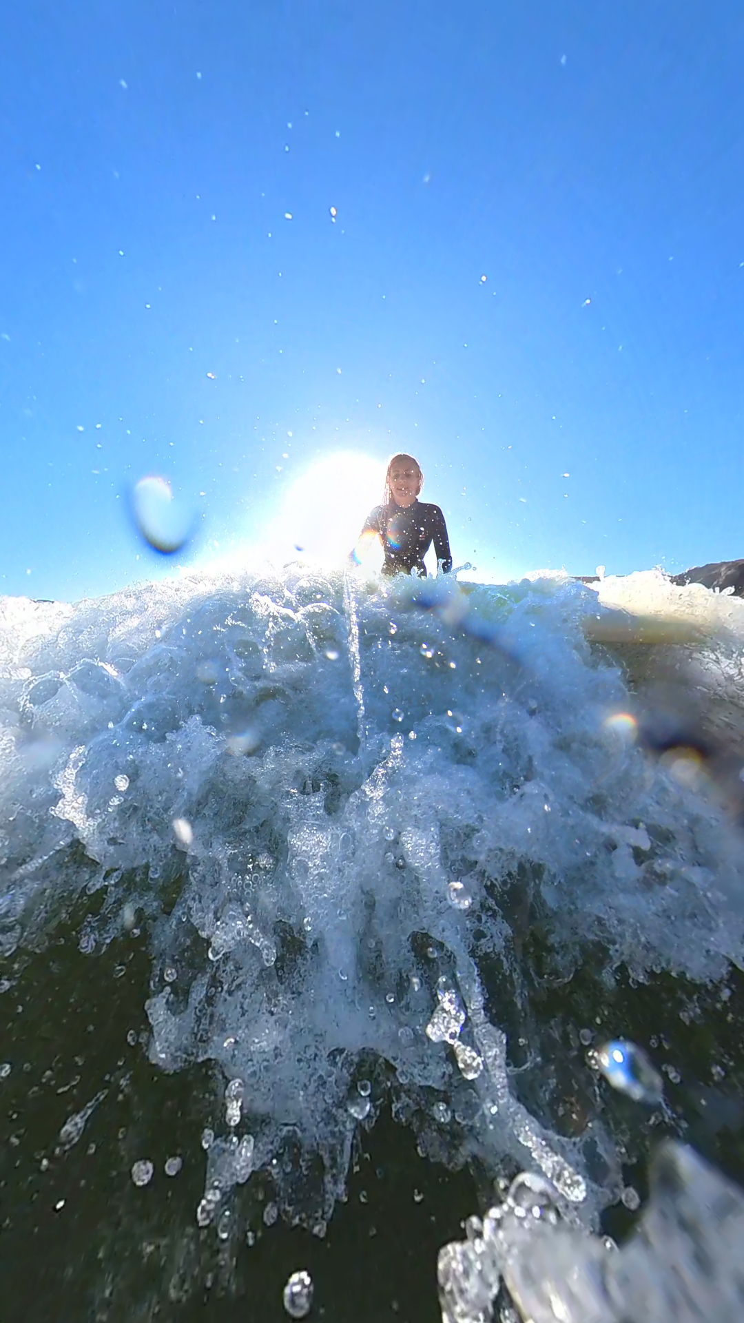 Paddling out through whitewater
